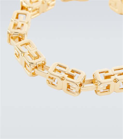 GIVENCHY G Cube gold.